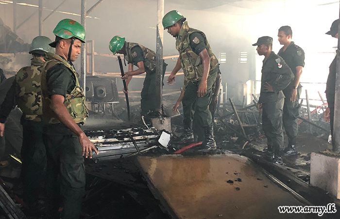 West Troops Help Extinguish Fire at Gonawala