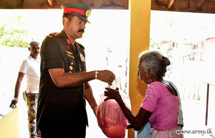 East Troops Take Dry Ration Packs to Doorsteps