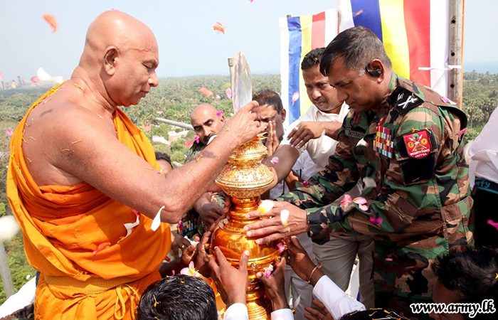 Amidst Chanting, Pinnacle atop Troops-Reconstructed Pagoda Placed