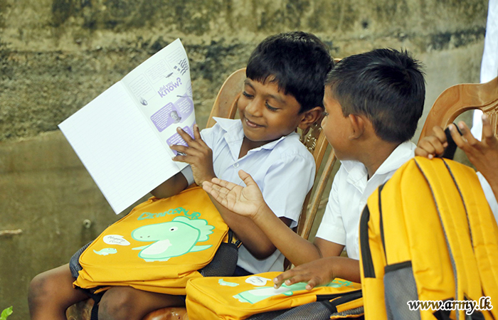 144 Brigade Troops with Sponsors' Help Give Free School Accessories