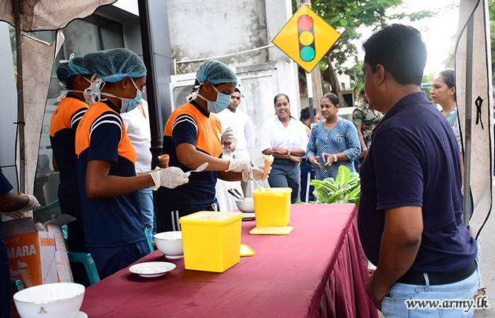 Women Soldiers in SLAWC Offer Free Ice Cream on ‘Poson’ Day