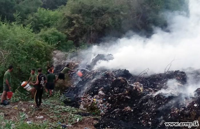 22 Infantry Division Troops Join to Extinguish Fire in Garbage Dump