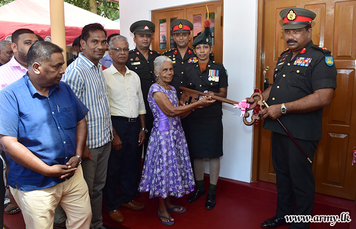 Fellow-Soldiers Rebuild Woman Soldier's Gutted Home