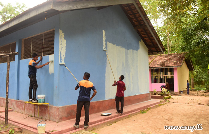 24 Infantry Division Re-paints School Buildings & Provides a Facelift 