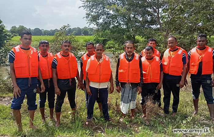 Army Troops Evacuate Two Villagers from Flooded Area
