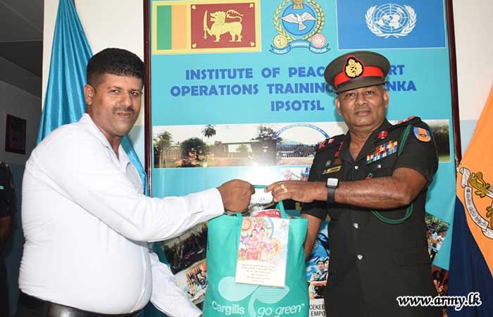 IPSOTSL Distributes Dry Ration Packs to Support Civilian Employees