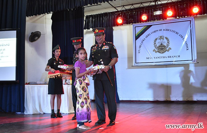 Troops of 12 Gemunu Watch Distribute School Accessories to Students
