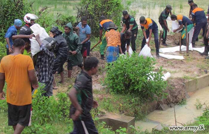 Troops Assist in Safeguarding Palamkulam Tank Bund Amidst Adverse Weather