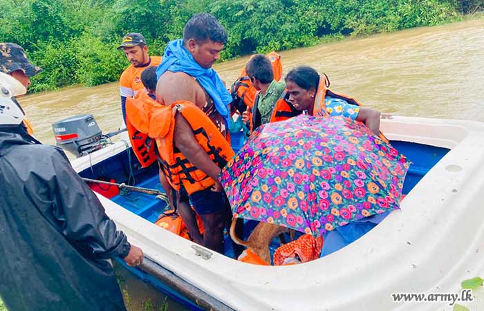 Troops of 10 SLLI Rescue Flood Affected Family in Sivapuram