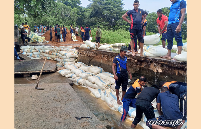 23 Infantry Division and 9 SLA Repair Magulpokuna-Kalingawila Road Following Overflow of Magulpokuna Tank