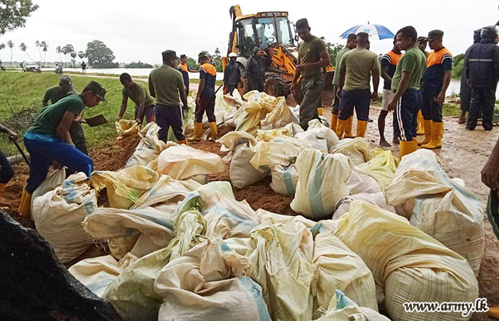 East Troops Repair Flood Damaged Bund of Weerayadi Lake