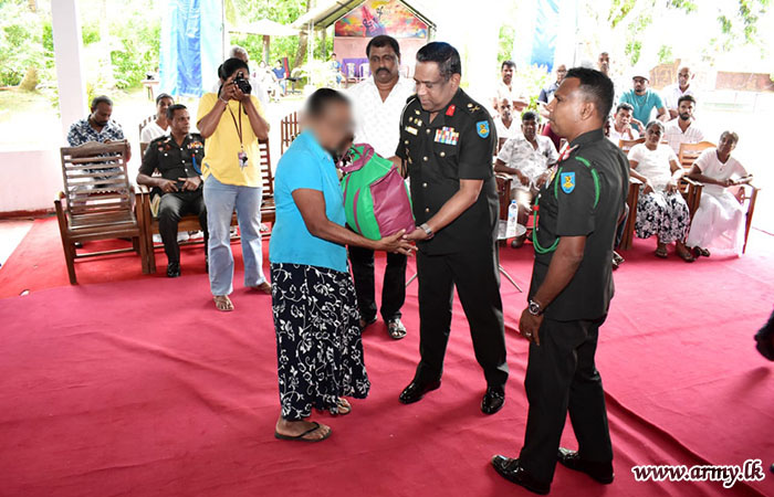 2 (V) SLSC Distributes Dry Ration Packs to 90 Low-Income Families and Provides Essential Items to 10 Temples