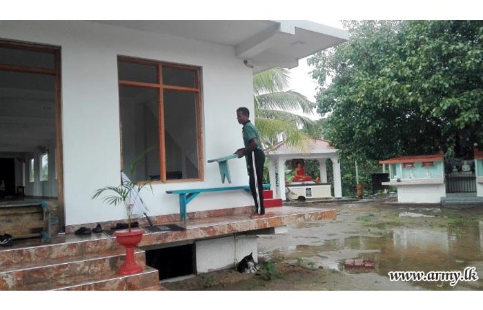 SFHQ-C Troops Conduct 'Shramadana' to Clean Temple Premises