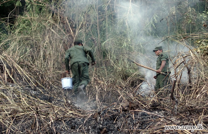 9 SLSR Troops Douse Bush Fire