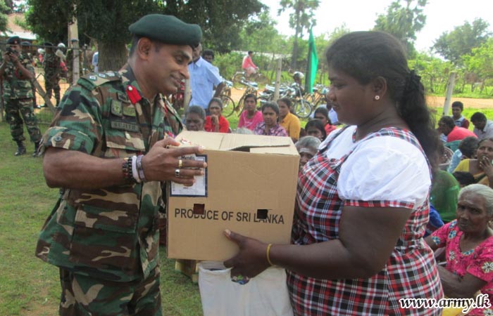 653 Brigade Troops Distribute Chickens to Promote Living Conditions