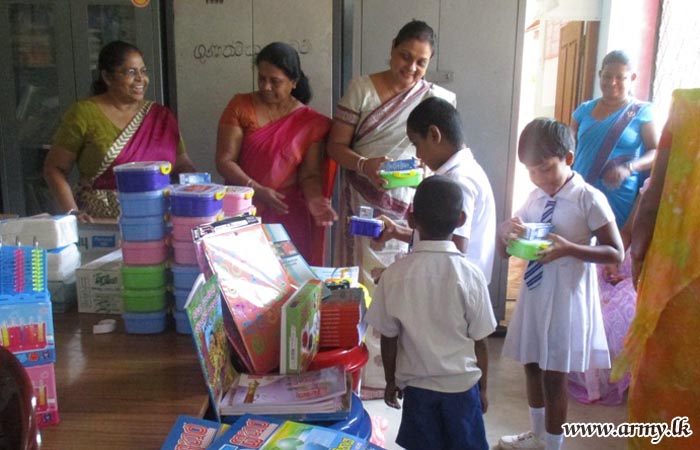 12 Div Troops Coordinate Distribution of School Accessories