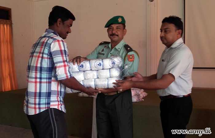 Army Troops Distribute Fishing Nets