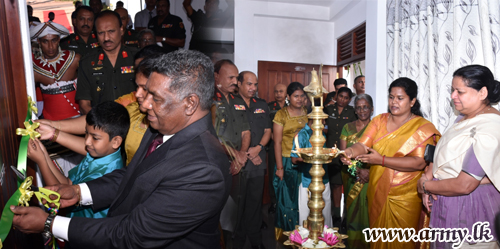 Officer’s Widow Vested with New Home   
