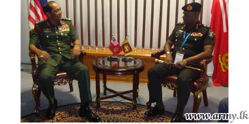 Commander in Malaysia Shares Views with Malaysia's Chief of Army  