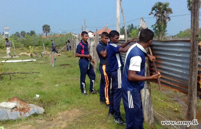 Troops Ensure School Safety Mending Fence  & Conduct Kovil Shramadana 