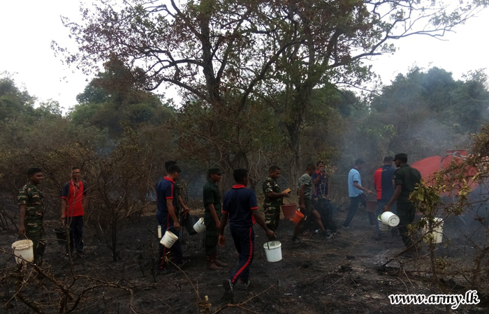 Army Personnel Douse Wildfire in Somawathiya